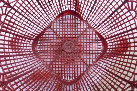 Red Plastic Basket Geometric Pattern Background 스톡 사진