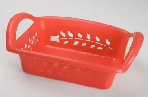 Red plastic basket Foto stock