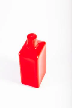 Red plastic bottle isolated on white background Stock Photos