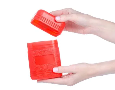 Red plastic box container in hand Stock Photos