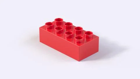 Red Plastic Building Block on a White Background. 3d render with a work path Illustrazione stock