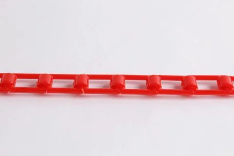 Red plastic chain on a white background Stock Photos