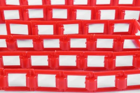 Red plastic chain on a white background Stock Photos