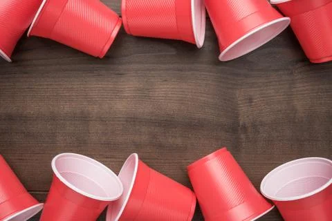Red plastic cups on table Stock Photos