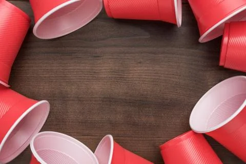 Red plastic cups on table Stock Photos