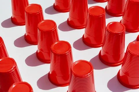 Red Plastic Drinking Cups pattern as a background Stock Photos