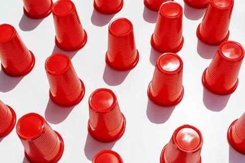 Red Plastic Drinking Cups pattern as a background Stock Photos
