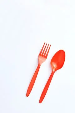 A red plastic fork and spoon Foto stock