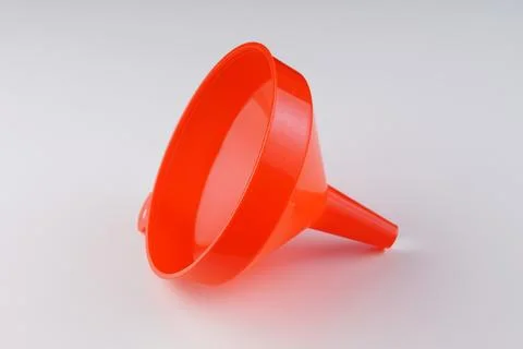 Red plastic funnel Stock Photos