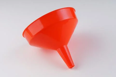 Red plastic funnel Stock Photos