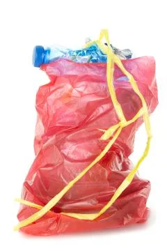 Red plastic garbage bag isolated on white background Stock Photos