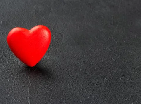 Red plastic heart Stock Photos