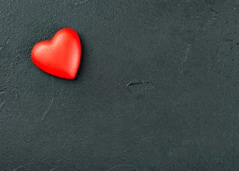 Red plastic heart Stock Photos