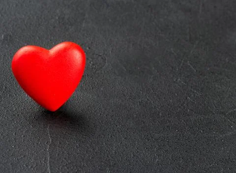 Red plastic heart Stock Photos