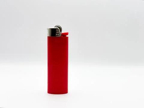 Red plastic lighter on a white background in full length side view Stock Photos