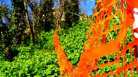 Red plastic net for marking off work in progress or areas not accessible Stock Footage 121170211