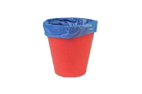 Red plastic trash or garbage bin on white background. 库存照片
