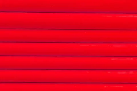 Red plastic tubing pattern texture background Stock Photos
