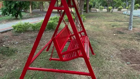 A red play swing is located in toy Stock Footage 258251458