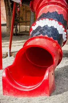 Red playground slide Stock Photos