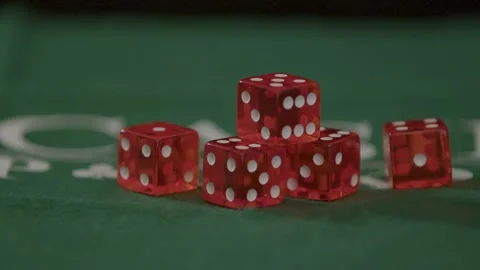Red-playing-dice-on-poker-table-moving-camera-closeup Stock Footage 150428042