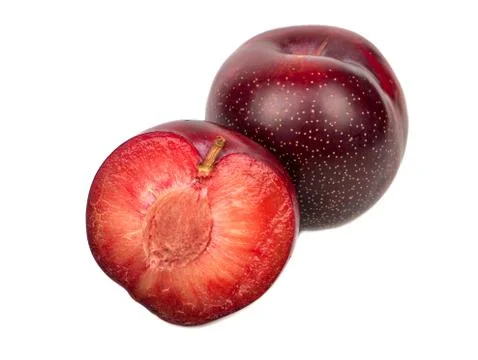 Red plum with half Stock Photos