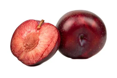 Red plum with half Stock Photos