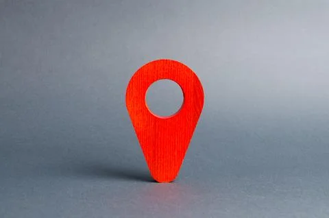 Red pointer location on a gray background. Concept of navigation and venue... Stock-Fotos