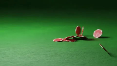 Red poker casino chips flying above green casino table in slow motion Stock Footage