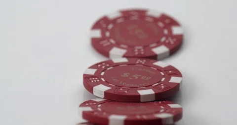 Red poker chips falling Stock Footage 112329321