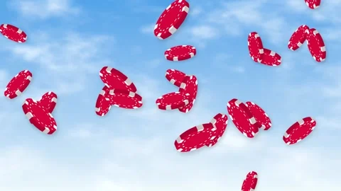 Red Poker Chips Falling Through a Bright Blue Sky with Clouds Stock Footage 343819470