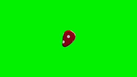 Red polka dot comma punctuation mark on green screen background Stock Footage 345131642