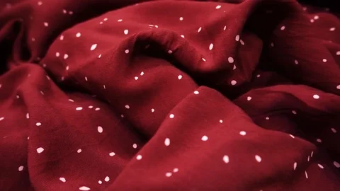 Red polka dot texture. It moves and crumples. Stock Footage 112626156