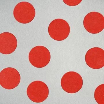 Red polka dots pattern on gray paper texture Stock Illustration