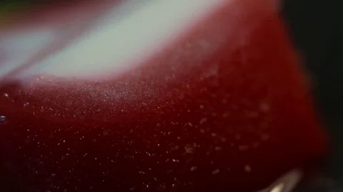 Red Popsicle Defrosting Close-Up MAC Stock Footage 74750209