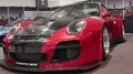 Red Porsche GT racing car exhibition at fair Hannover Messe ABF 4k or 4k+ Resolution