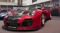 Red Porsche GT racing car exhibition at fair Hannover Messe ABF 4k or 4k+ Resolution