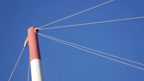 Red post blue sky Stock Footage 78748133