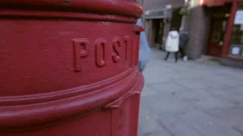 Red Post Letter Box in UK City Stock Footage