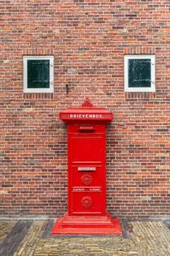 Red postbox in Netherlands. Stock Photos
