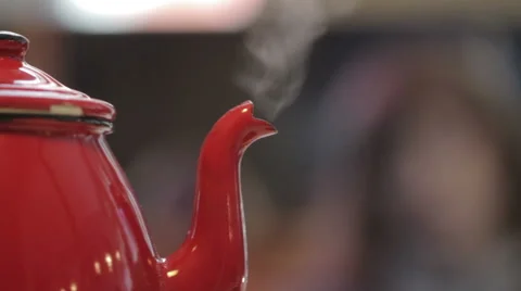 Red pot boiling in a sewing studio. Stock Footage 60747286