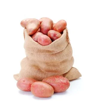 Red potatoes in sack Stock Photos