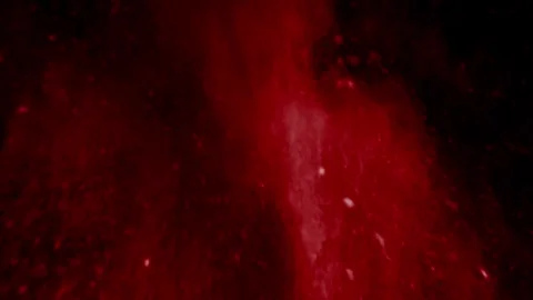 Red powder explosion from bottom on black background Stock Footage 274683371
