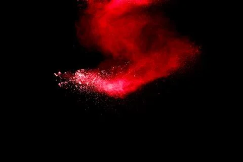 Red powder explosion cloud on black background. Freeze motion of red color du Stock Photos