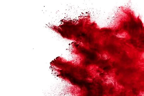 Red powder explosion cloud on white background. red color dust. 库存照片