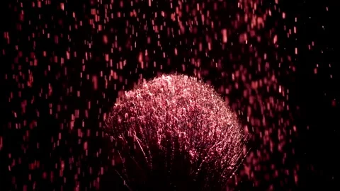 Red powder falling on black brush for blush Stock Footage 337471220