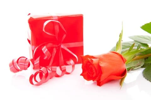 Red present and rose Stock Photos