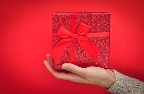 Red present box with bow. Gift for Christmas Stock Photos