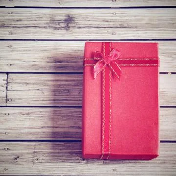 Red present box with retro filter effect Foto stock