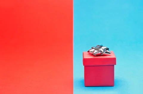 Red present with silver bow Stock Photos